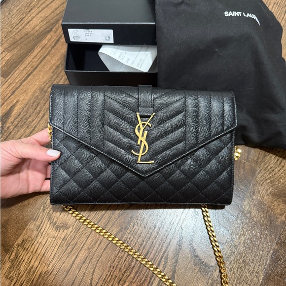 Saint Laurent Handbags - Saint Laurent Black Quilted Clutch with Gold Chain